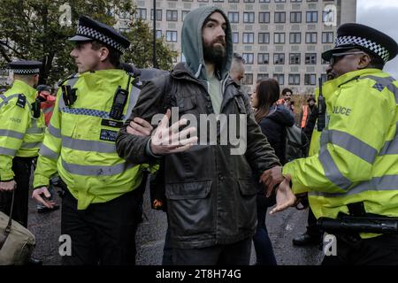 Just Stop Oil activists take to the streets of London and some of the members are arrested by the police / London-18/11/2023 Stock Photo