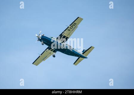 Cessna 208b Grand Caravan G-CPSS light aircraft ascends after take-off Stock Photo