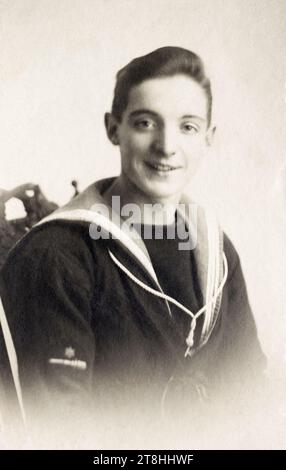 A Royal Navy sailor with a Seaman Gunner trade badge. Stock Photo