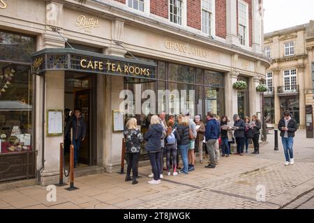 YORK, UK - April 19, 2023. People queueing outside Bettys Tea Rooms, a famous cafe in York, UK Stock Photo