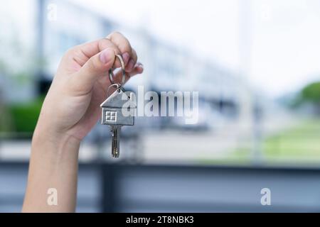 Female Hand Holding House Keys Stock Photo