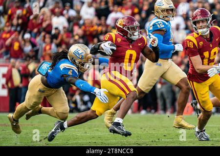 UCLA defensive lineman Carl Jones Jr. celebrates after a fumble ...