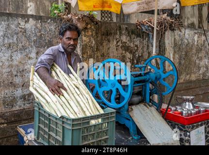 Portrait of street vendor of sugar cane juice, Fort Kochi, Cochin, Kerala, India Stock Photo