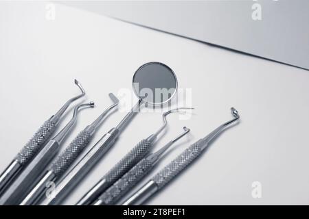 Dental tools on a gray background. Dentist equipment and tools Stock Photo