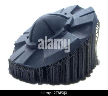 Black abstract object printed on 3D printer from photopolymer isolated on white background. SLA. Model 3D printed from liquid resins. Progressive additive 3D printer printing technology. Sla-printing. Stock Photo