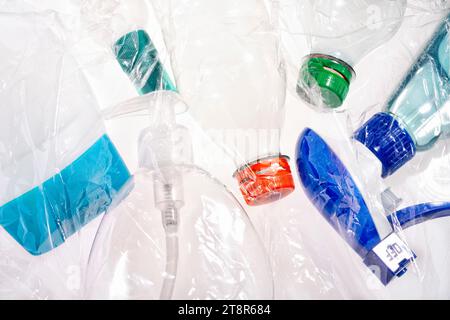 Plastic bottles in different colors with plastic foil Stock Photo