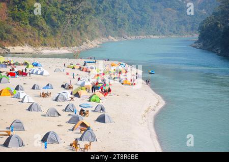 camping tent and river rafting Stock Photo