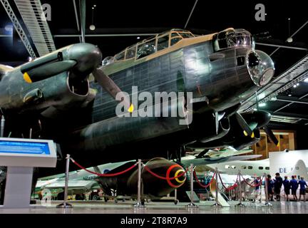 Avro Lancaster Bomber, The Avro Lancaster is a British four-engined Second World War heavy bomber designed and built by Avro for the Royal Air Force (RAF). It first saw active service with RAF Bomber Command in 1942 and, as the strategic bombing offensive over Europe gathered momentum, it became the main heavy bomber used by the RAF, the RCAF, and squadrons from other Commonwealth and European countries serving within the RAF, overshadowing its close contemporaries the Handley Page Halifax and Short Stirling. Stock Photo