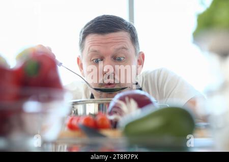 Funny Face Vlogger Chef Blowing Kitchen Spoon Stock Photo