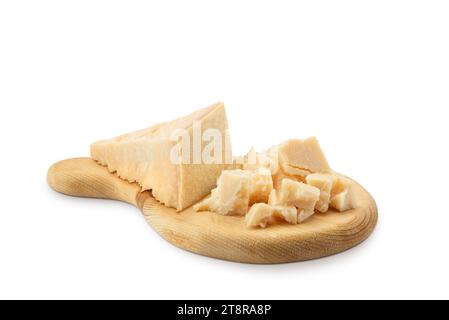 Parmesan cheese blocks on wooden board isolated on white background. Stock Photo