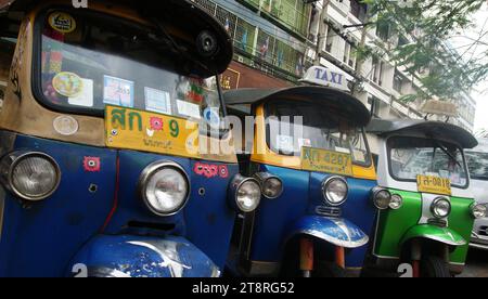 Tuk Tuk Tuk, An auto rickshaw (in India), or rickshaw (in Pakistan) also known as a Bajay or Bajaj (in Jakarta, Indonesia), three-wheeler (in Sri Lanka), samosa, tempo, tuk-tuk (in Thailand), trishaw, autorick, bajaji (in Madagascar and Tanzania), keke Napep or Maruwa (in Nigeria), rick, tricycle (in the Philippines), mototaxi, baby taxi, lapa or tukxi (Piaggio Ape Calessino) in popular parlance, is a motorized development of the traditional pulled rickshaw or cycle rickshaw Stock Photo