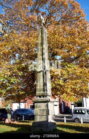 18th century obelisk on the green in front of st cuthberts church Churchtown southport merseyside england uk Stock Photo