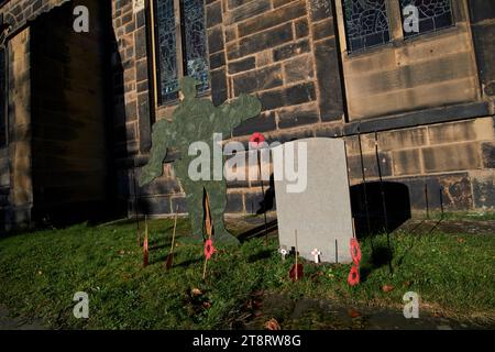 commonwealth war grave memorial in the churchyard at st cuthberts church of england church Churchtown southport merseyside england uk Stock Photo