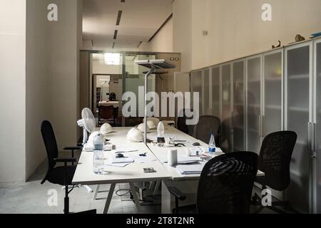 architect design working drawing sketch plans blueprints and making architectural construction model in architect studio Stock Photo