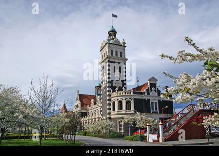 Dunedin Railway Station NZ, Dunedin railway station in Dunedin on New Zealand's South Island, designed by George Troup, is the city's fourth station. It earned its architect the nickname of 'Gingerbread George Stock Photo