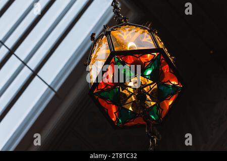 Luxury vintage chandelier made of colorful stained glass. Close up fragment photo with selective focus Stock Photo