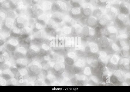 Expanded polystyrene foam porous material white cells circle, close-up macro representing foamed, full depth of field Stock Photo