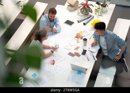 Group of architects and civil engineer discussing project Stock Photo