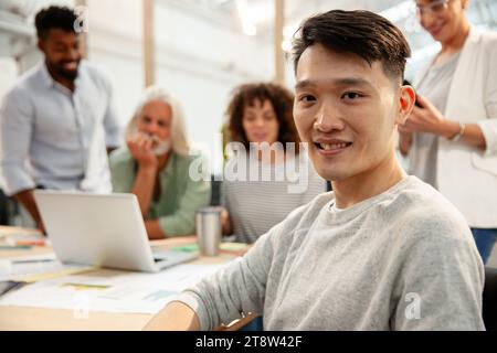 Young adult graphic designer looking at the camera Stock Photo