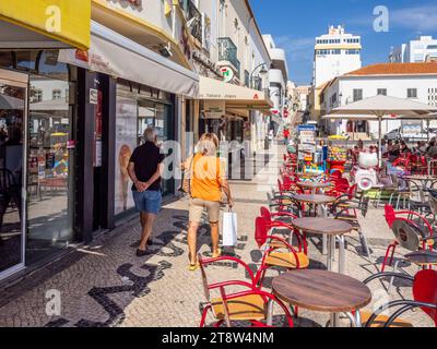 Outdoor cafe in the old town area of Portimao in the Faro District of the Algarve in Portugal Stock Photo