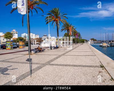 Waterfront promenade along the Arade River in Portimao in the Faro District of the Algarve in Portugal Stock Photo