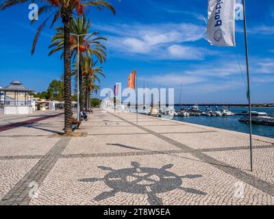 Waterfront promenade along the Arade River in Portimao in the Faro District of the Algarve in Portugal Stock Photo