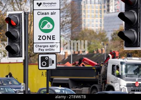 Cars in the 30mph Clean Air Zone run by Birmingham City Council along the A38 Bristol Street in the city centre on 9th November 2023 in Birmingham, United Kingdom. The Clean Air Zone covers the city inside the inner ring road but not include the Middleway itself. A Clean Air Zone aka CAZ, is an area in selected UK cities where targeted action is taken to improve air quality. A CAZ can be non-charging or charging. Whether a vehicle is charged when entering or moving through a CAZ depends on the type of vehicle. Ultra-low-emission vehicles are not charged when entering or moving through a Clean Stock Photo