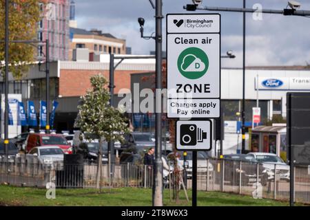 Cars in the 30mph Clean Air Zone run by Birmingham City Council along the A38 Bristol Street in the city centre on 9th November 2023 in Birmingham, United Kingdom. The Clean Air Zone covers the city inside the inner ring road but not include the Middleway itself. A Clean Air Zone aka CAZ, is an area in selected UK cities where targeted action is taken to improve air quality. A CAZ can be non-charging or charging. Whether a vehicle is charged when entering or moving through a CAZ depends on the type of vehicle. Ultra-low-emission vehicles are not charged when entering or moving through a Clean Stock Photo