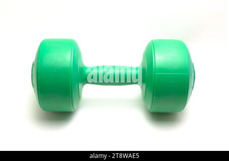 Green barbell dumbbells weighing 5 kg on a white background Stock Photo