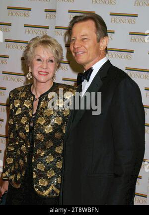 Michael York and wife Pat York attend the Kennedy Center Honors Trustees Dinner at the Department of State in Washington, DC on December 4, 2004.  Photo Credit: Henry McGee/MediaPunch Stock Photo