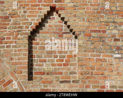 Historical bricked-up city wall openings next to the Kuhtor, serving as architectural relics and part of the city's history. Stock Photo