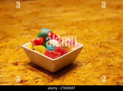 Bowl of jellied sweets on bar Stock Photo