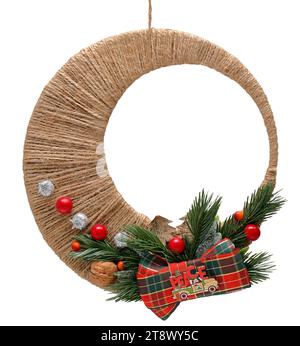 Christmas wreath made of yarn on white background with PEACE inscription. Stock Photo