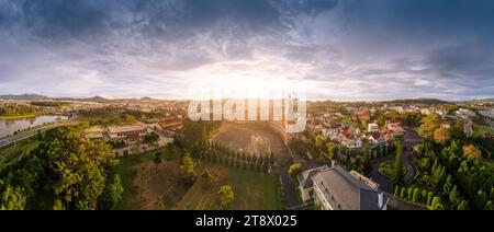 Aerial view of Da Lat Pedagogical College in the city of Da Lat near Xuan Huong lake in the morning. Tourist city in developed Vietnam. Travel and con Stock Photo