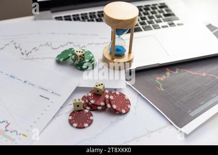 Stockholm, Sweden. 10-10-2022. Double dice on the stock market paper or newspaper. Concept of skill or luck. Stock Photo