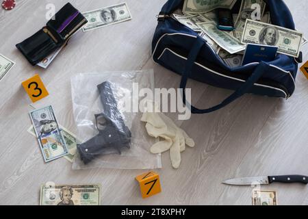 robbers in black bag with money Stock Photo