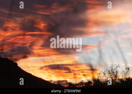 Colorful sunset with ufo clouds in the mountains of Spain Stock Photo