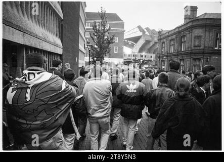 Fans head down Quay Street towards Westgate Street with the iconic concrete arms of the old stadium on the horizon. FIFA World Cup 1994 Group 4 Qualification – Wales v RCS (Czechoslovakia AKA Representation of Czechs and Slovaks) at Cardiff Arms Park, Wales, UK on 8 September 1993. A win for Wales in this game would almost guarantee qualification with 2 group matches remaining. They led 2-1 but conceded a late free kick goal from Peter Dubovský and the match ended 2-2. Photo: Rob Watkins Stock Photo