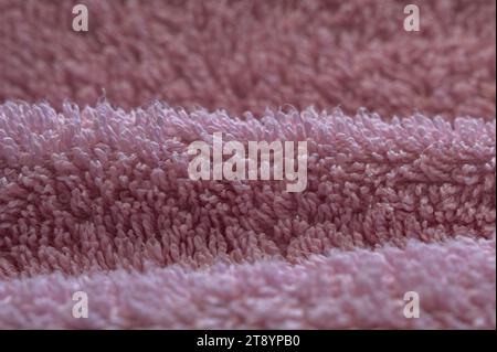 Pink bathroom towel texture close up Stock Photo