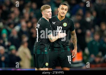 Republic of Ireland's Adam Idah (right) celebrates scoring their side's first goal of the game with team-mate James McClean during an International Friendly match at the Aviva Stadium, Dublin. Picture date: Tuesday November 21, 2023. Stock Photo