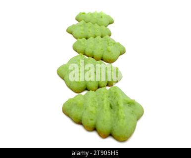Top down photo of green christmas tree spritz cookies on a plate Stock Photo