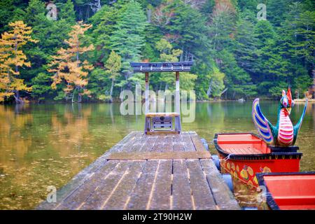 Idyllic landscape of Myojin pond at Hotaka Rear shrine in Kamikochi, Nagano, Japan (Japanese language meaning 'Myojin Pond') Stock Photo