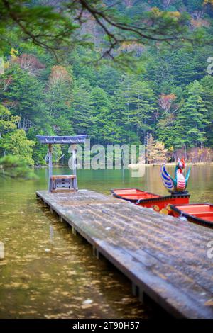 Idyllic landscape of Myojin pond at Hotaka Rear shrine in Kamikochi, Nagano, Japan (Japanese language meaning 'Myojin Pond') Stock Photo