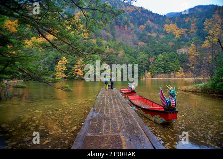 Idyllic landscape of Myojin pond at Hotaka Rear shrine in Kamikochi, Nagano, Japan (Japanese language meaning 'Myojin Pond') Stock Photo