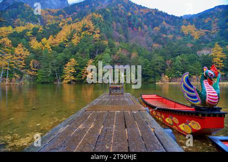 Idyllic landscape of Myojin pond at Hotaka Rear shrine in Kamikochi, Nagano, Japan (Japanese language meaning 'Myojin Pond') Stock Photo