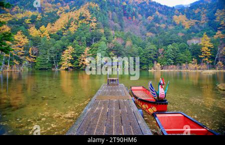 Idyllic landscape of Myojin pond at Hotaka Rear shrine in Kamikochi, Nagano, Japan (Japanese language meaning 'Myojin Pond') Stock Photo