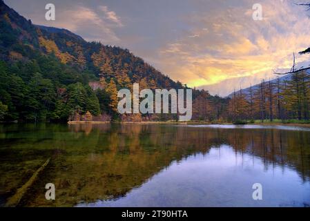 Idyllic landscape of Myojin pond at Hotaka Rear shrine in Kamikochi, Nagano, Japan (Japanese language meaning 'Myojin Pond') Stock Photo