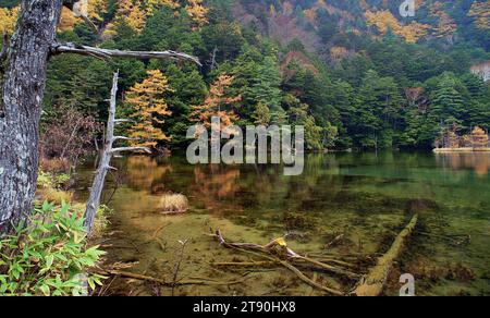 Idyllic landscape of Myojin pond at Hotaka Rear shrine in Kamikochi, Nagano, Japan (Japanese language meaning 'Myojin Pond') Stock Photo