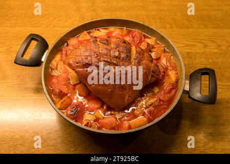 Finished roast pork in a roasting pan, crusty roast, root vegetables, Baden-Wuerttemberg, Germany Stock Photo