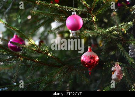 Old Fashioned Christmas Ornaments. Christmas ornaments, vintage glass baubles on a Christmas tree. Stock Photo